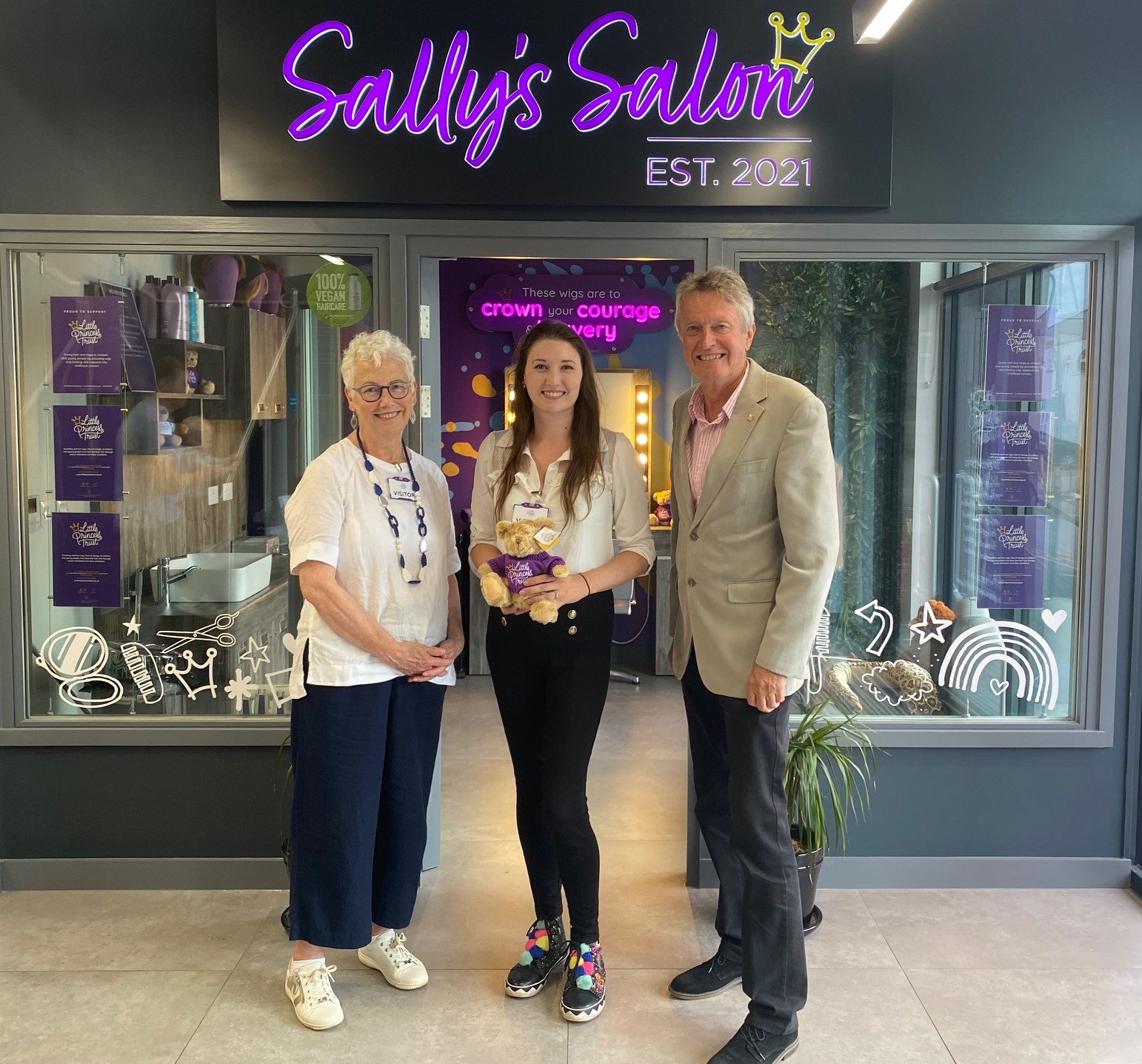 Dr Catherine Pointer, centre, at The Hannah Tarplee Building with (right) Little Princess Trust Trustee Tim Lowe and Dame Kathy August.