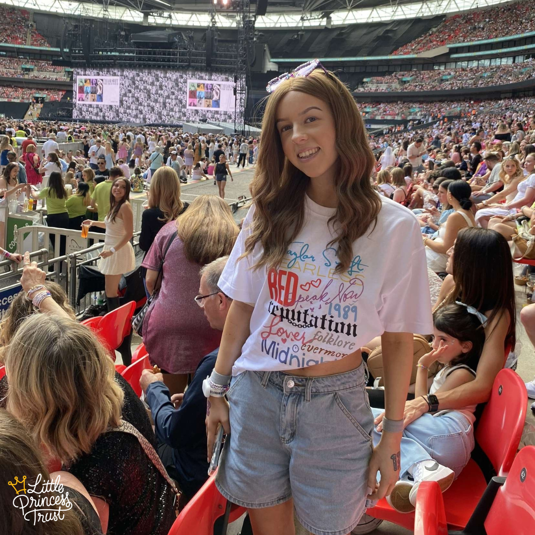 Lily wearing her LPT wig at The Eras Tour!